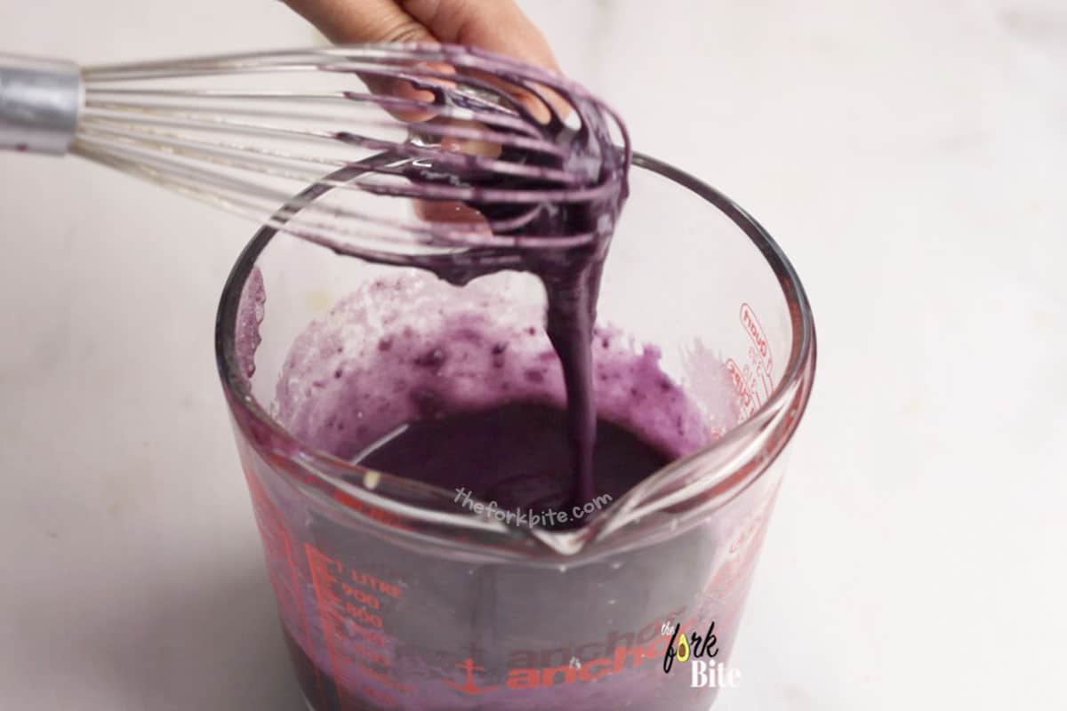 Add your ube extract and "halaya" puree. Mix this until the color is all the same.
