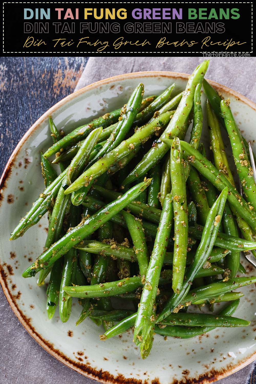 Beautiful, fresh, cut green beans, lavishly smeared with finely chopped garlic, stir-fried at high heat to create a superb, umami-flavored delight.