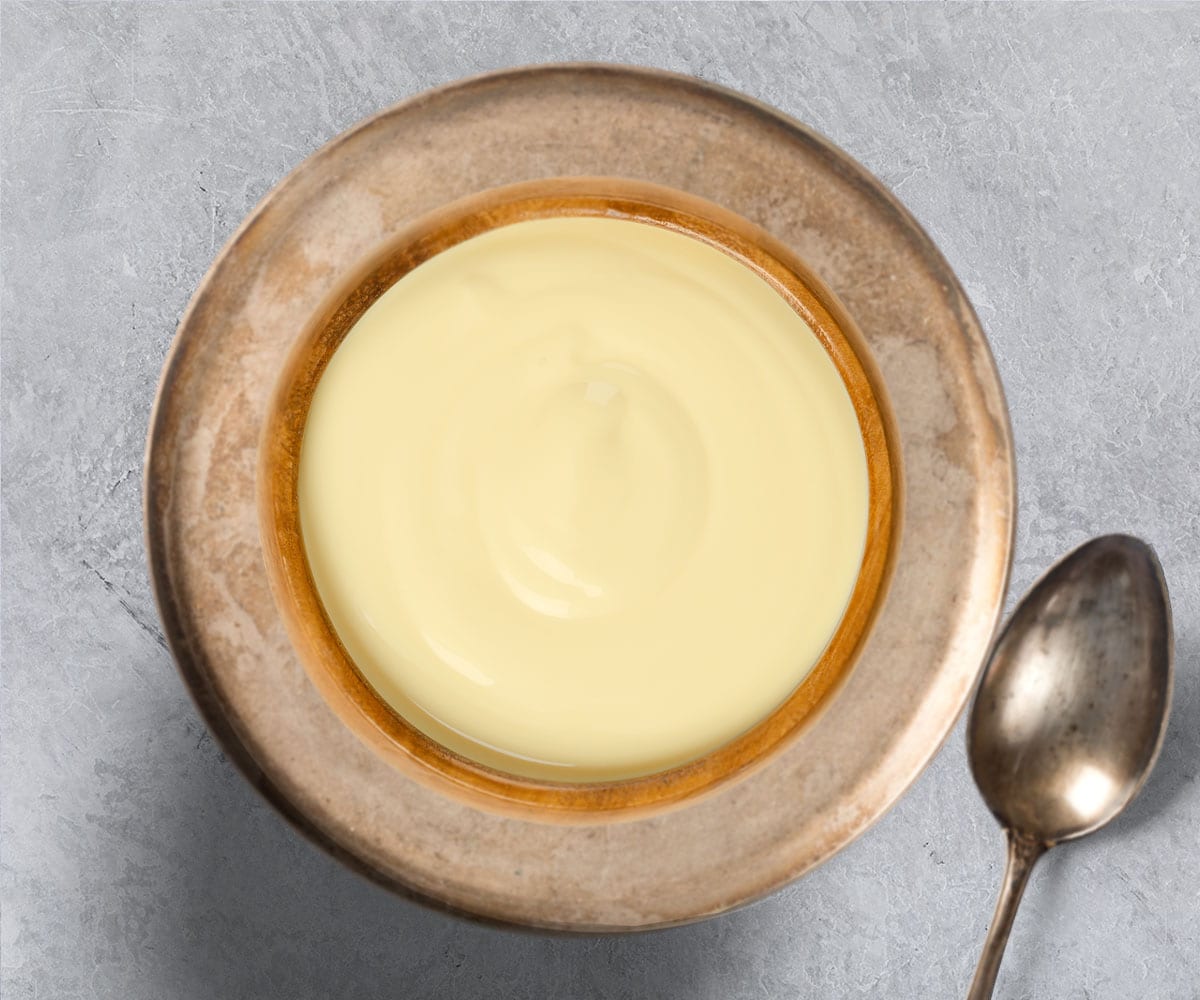 This sauce is an oil-in-water based emulsion. As mentioned previously, the main ingredients are melted butter, egg yolk, and lemon juice. If you so desire, you may use vinegar or even a white wine reduction in place of the lemon juice.