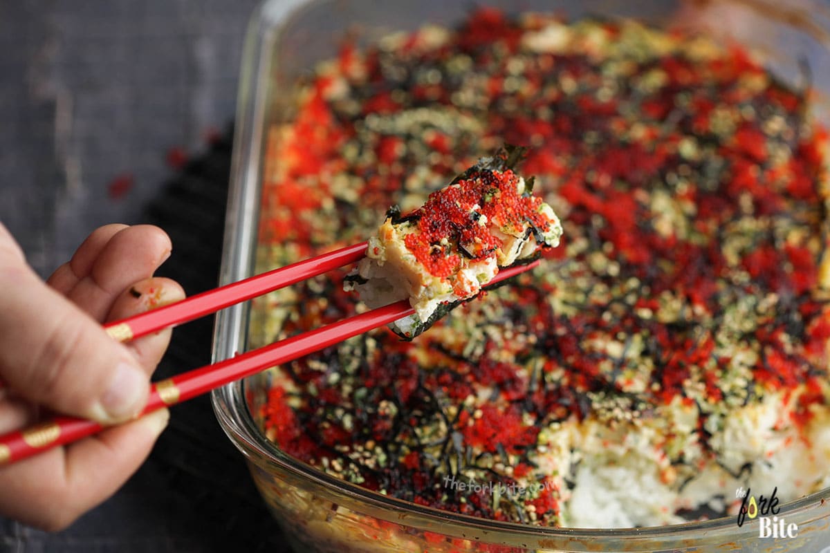I prefer to eat mine with Korean seaweed. All I do is, roast up my seaweed to where it is a bit on the crispy side. Then, I lie the pad down, scoop the sushi casserole out, and put it on top.