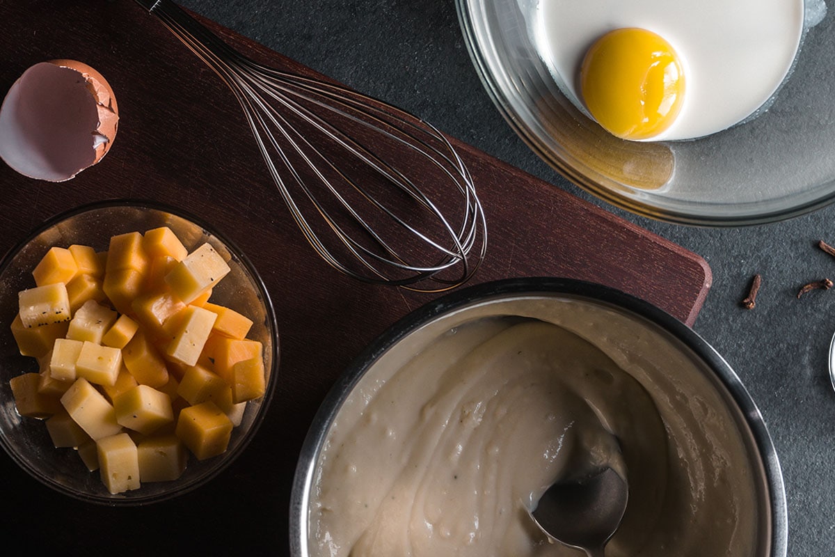 Add a drizzle of cream or milk to your egg yolk as this will help protect it from the heat.