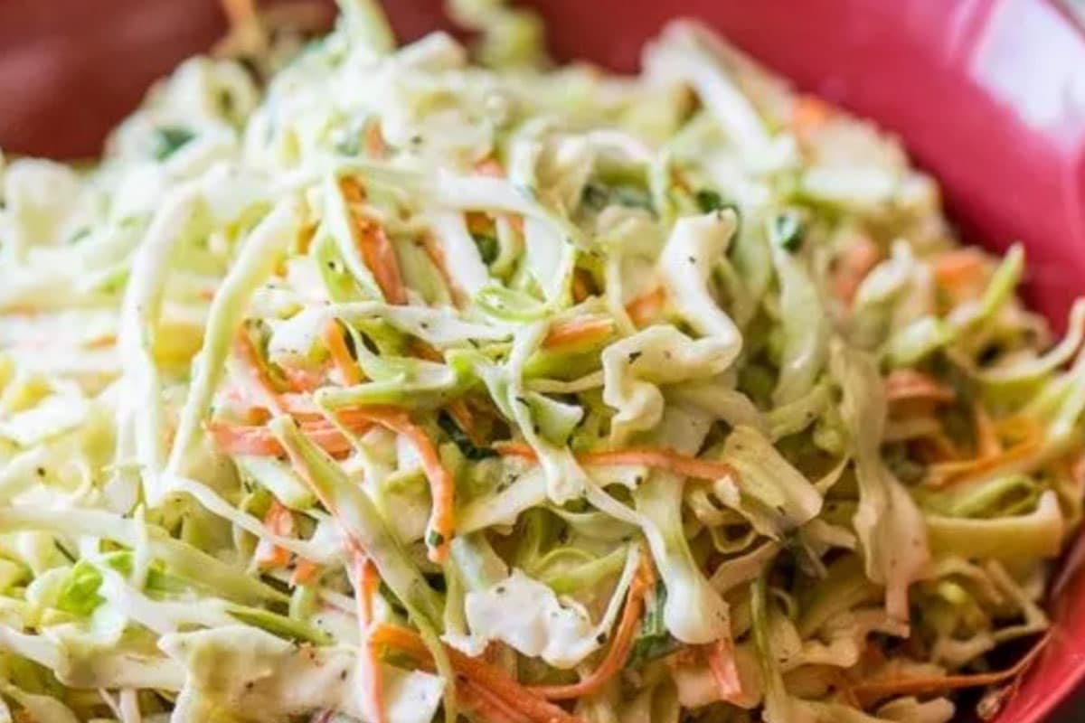 That crunch mixture of shredded raw cabbage and carrot in a creamy mayo dressing is a crowd-pleaser. When you service with Jambalaya, you might want to spice up the recipe a bit by adding a little mustard or vinegar.