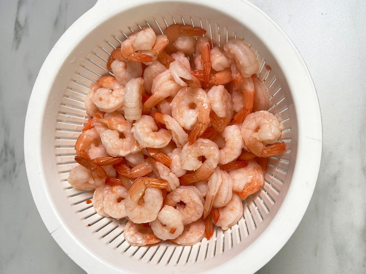 If you cook shrimp in the Jambalaya and freeze them, it's pretty nigh on impossible to avoid them being chewy when you come to reheat and eat them.