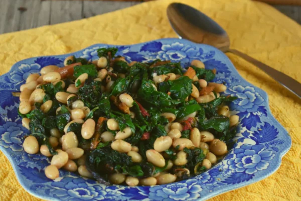 The main four ingredients are the Swiss Chard, a little fresh garlic, some white beans, and a little olive oil to saute.