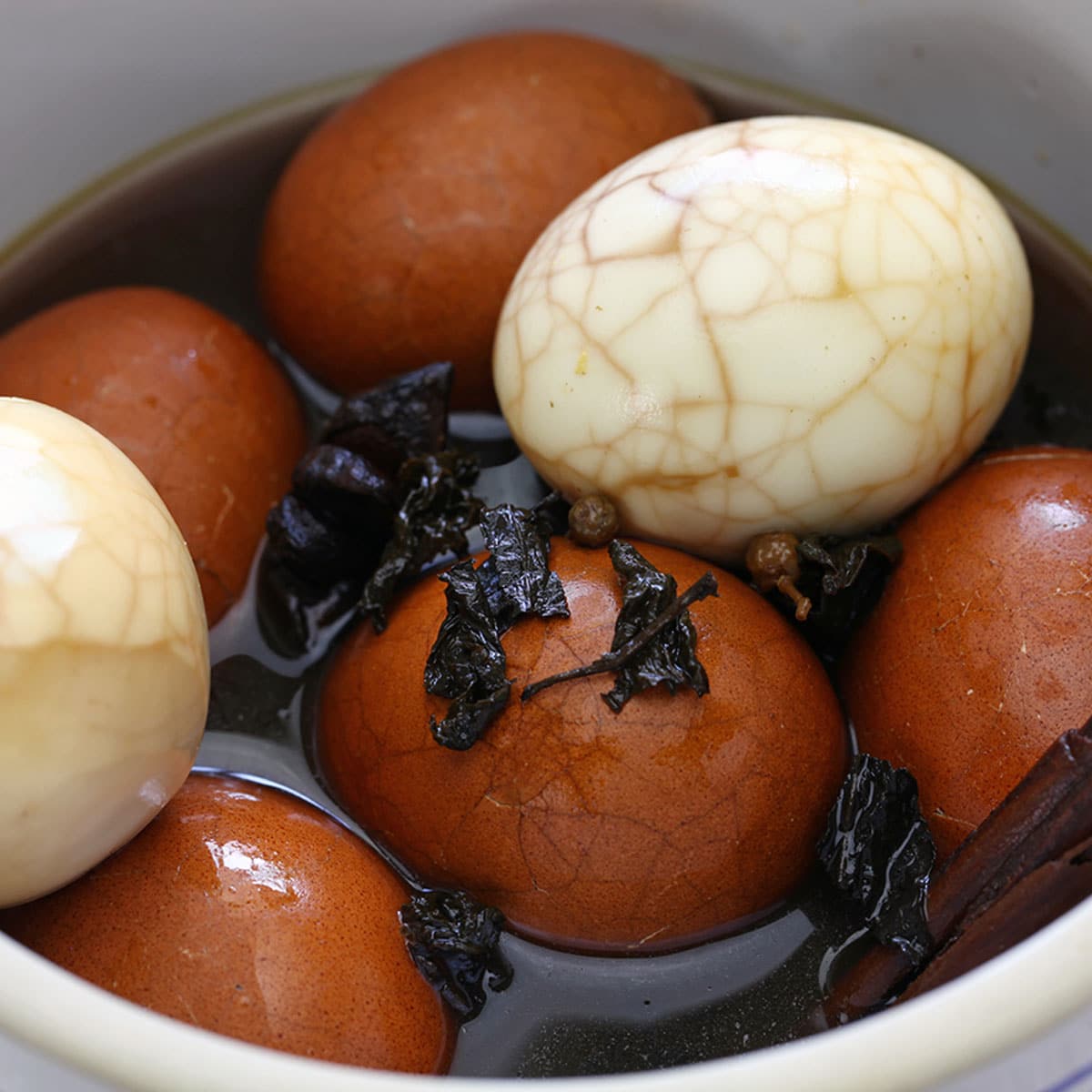 If you walk the streets of China, you will be sure to come across street vendors selling Cha Ye Dan, (茶叶蛋 /茶葉蛋)or Chinese Tea Eggs or Marbled eggs.