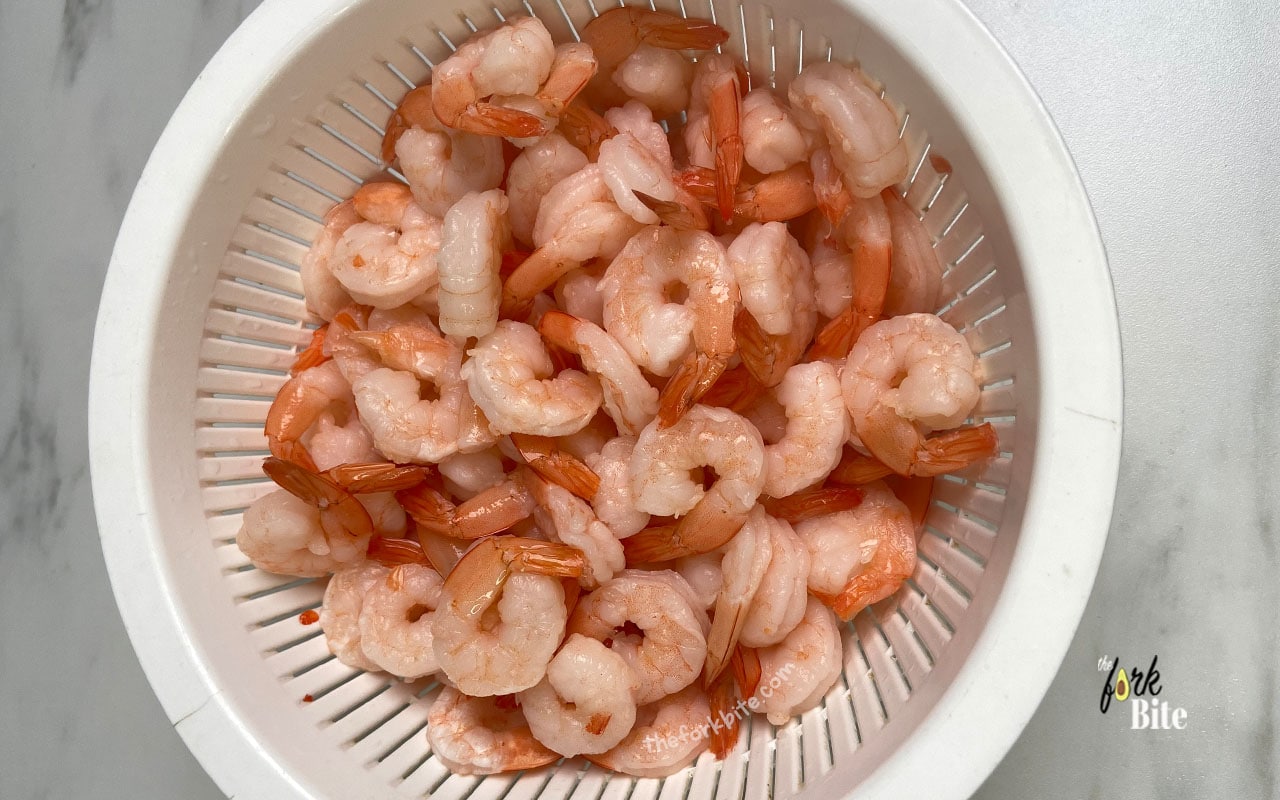 Clean your shrimp and ensure that they are completely thawed. Dry each with a paper towel and just set to the side.