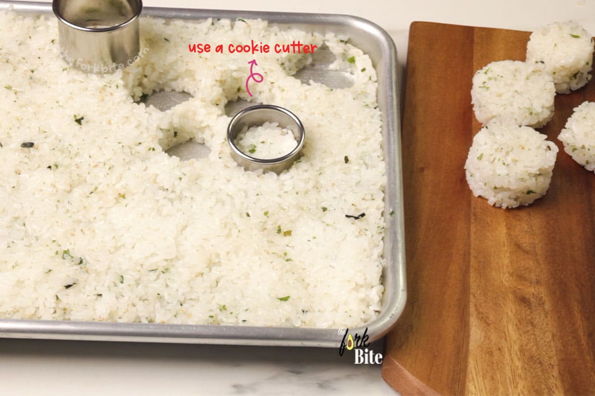 Put the rice into a baking sheet (lined with parchment paper), and level out. Let the rice cool down so that they become nice and firm before frying.