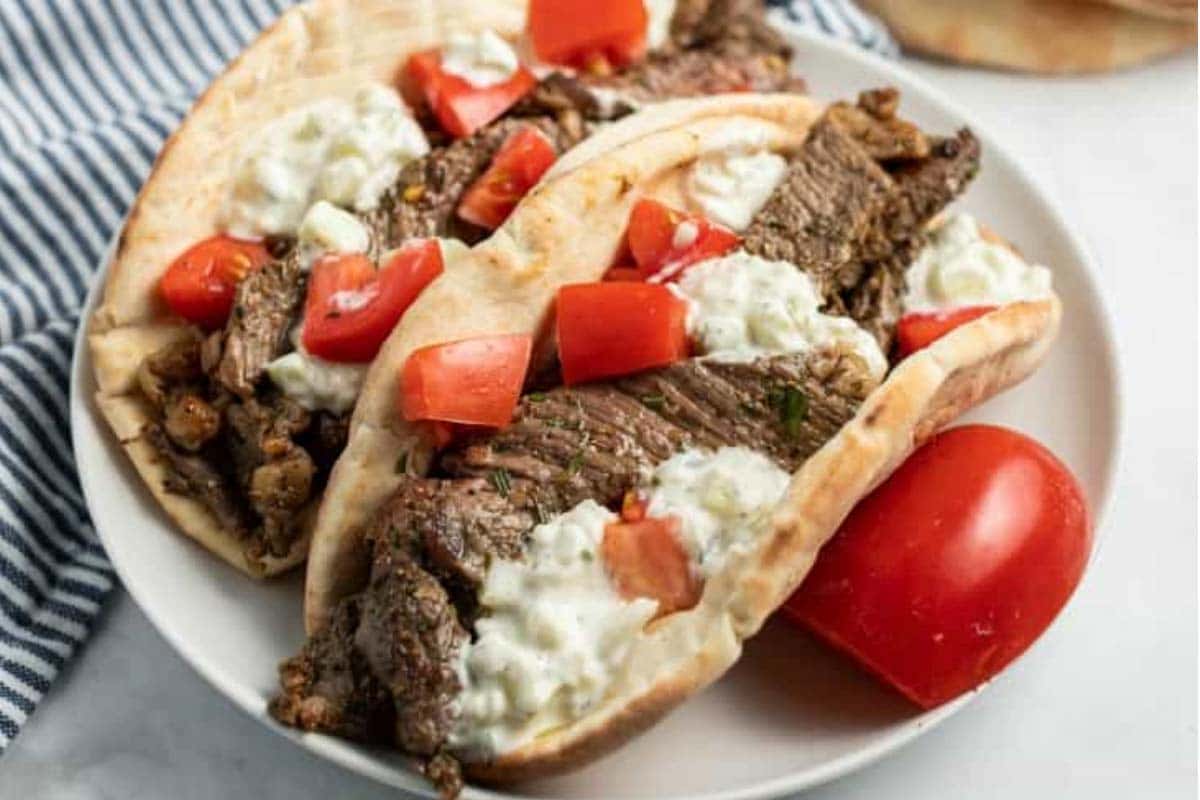 Leftover, pink roast beef is a great meat to put into a pita pocket. But if you don't have any leftovers handy, you can use a leftover hamburger pattie instead.