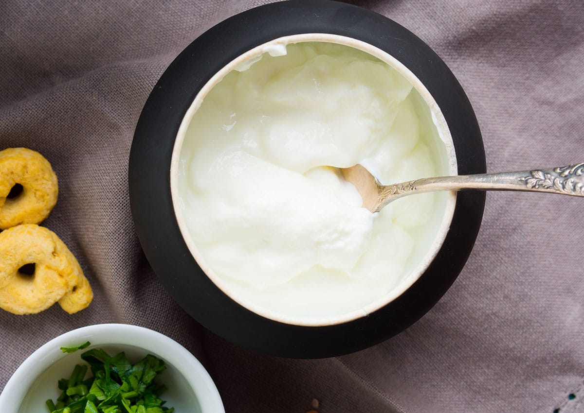 If you will be heating non-fat sour cream, it's best to heat it for just a few seconds at a time, stirring as you go to try and prevent it from curdling and separating.