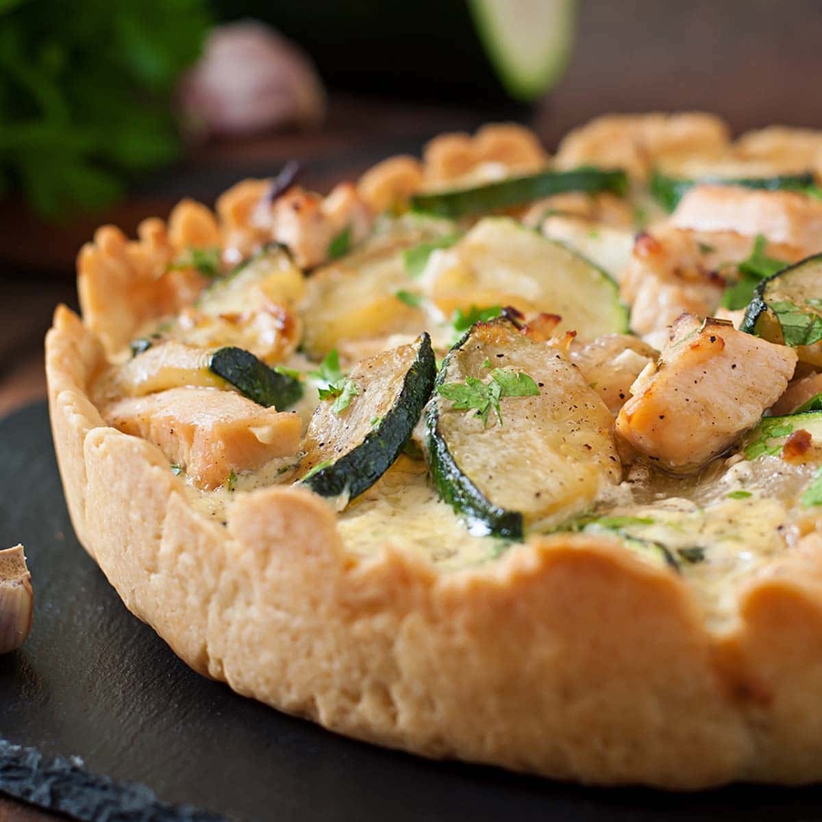 Once you finish baking the quiche, you need to leave it out in the open for 15 to 20 minutes or so until it has cooled down to room temperature.