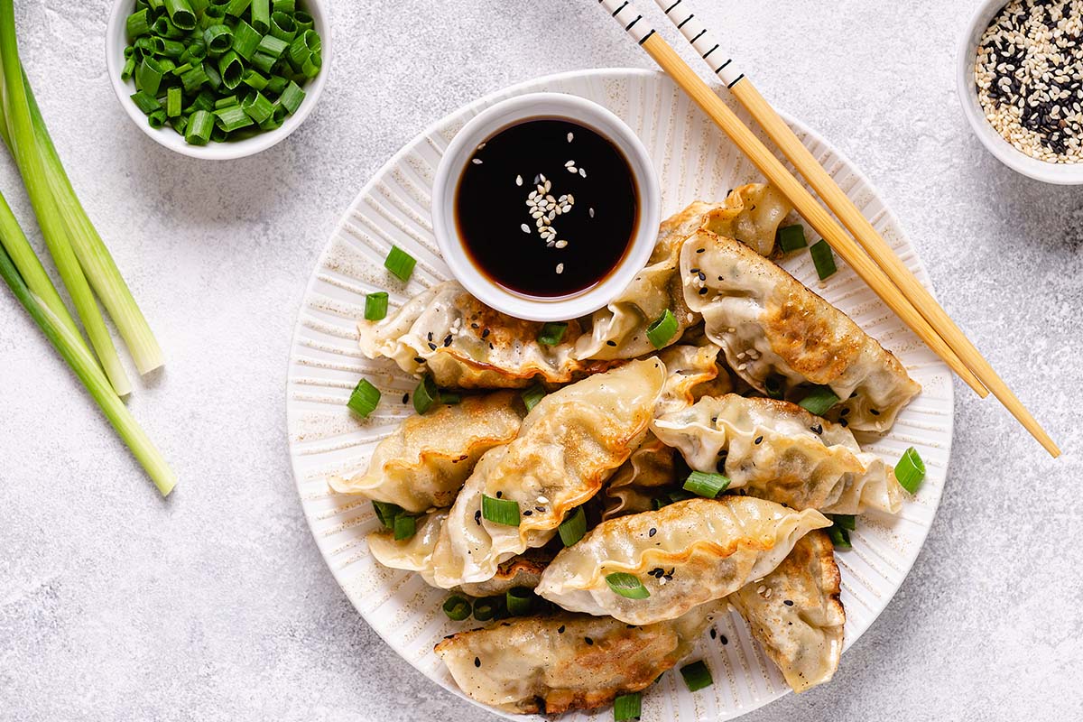 These gorgeous little garlicky dumplings, whether they are stuffed with chicken, pork, or shrimp, are a real treat, are delicious. You can dip them into the sweet chili or soy or teriyaki sauce that you serve with the sushi.