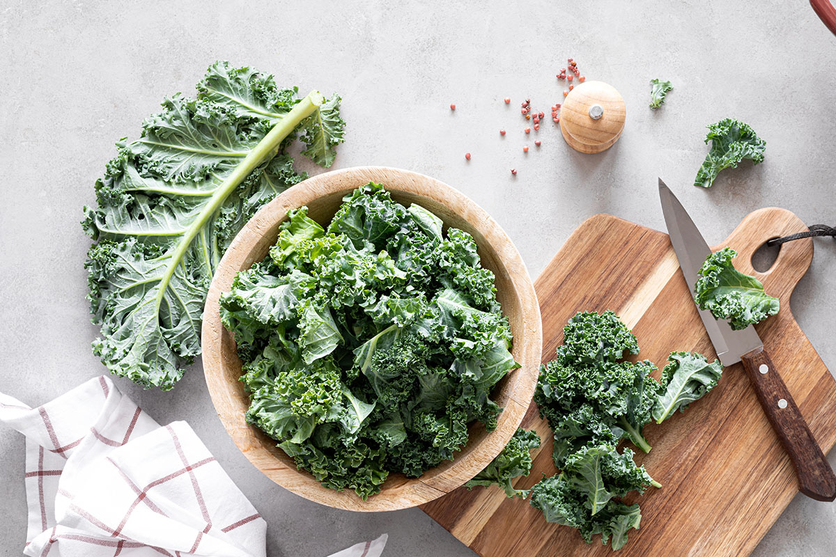 This Kale leafy veggie contains calcium and vitamins A and C, but you shouldn't be tempted to add it to your juices. It can cause kidney stones.