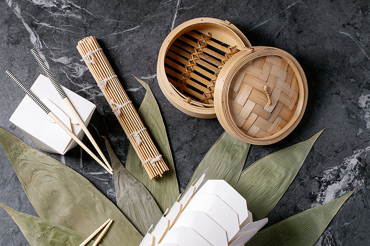 Each basket is created by weaving bamboo strips together into a ring.  The base is also made using narrow bamboo strips, interwoven to support the food placed in them and allow steam to pass through.