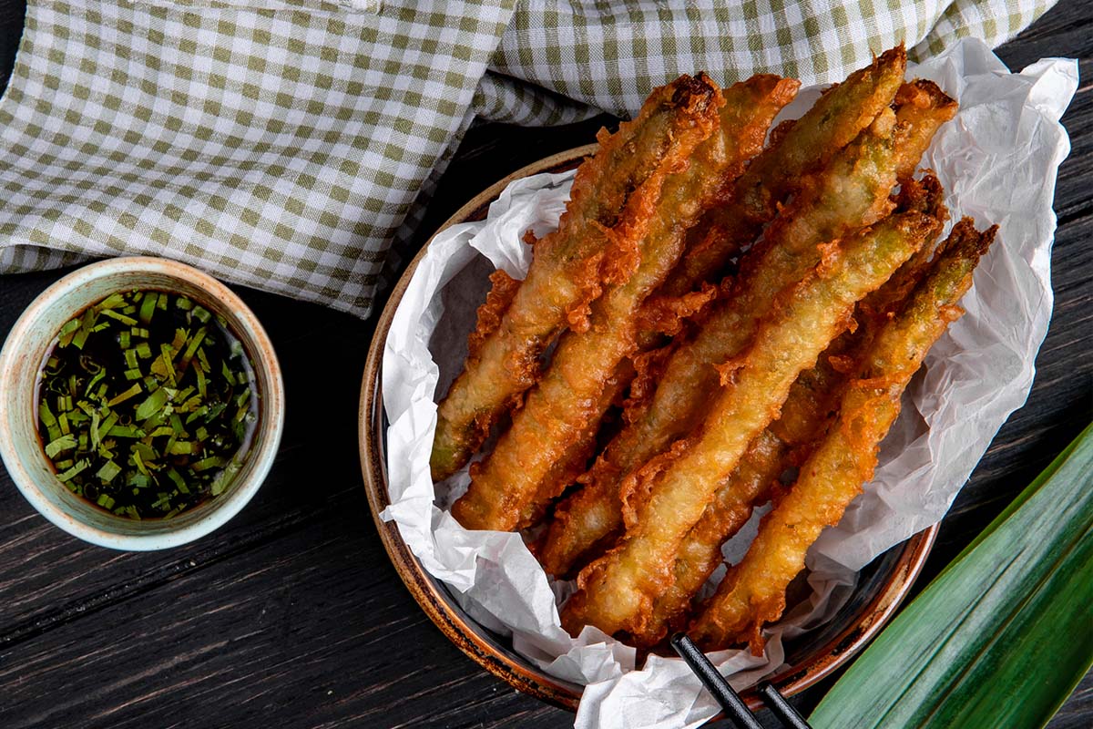 The art of making tempura is in the batter, and there is not a panko breadcrumb insight. It's just flour, and ice-cold water mixed tighter with a pair of chopsticks.