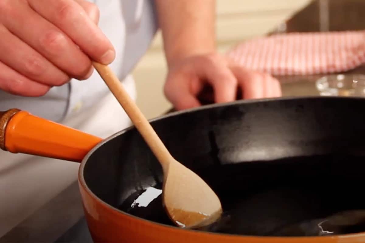 Dip in a wooden cooking spoon. The oil is ready when small bubbles rise up around the wooden spoon.