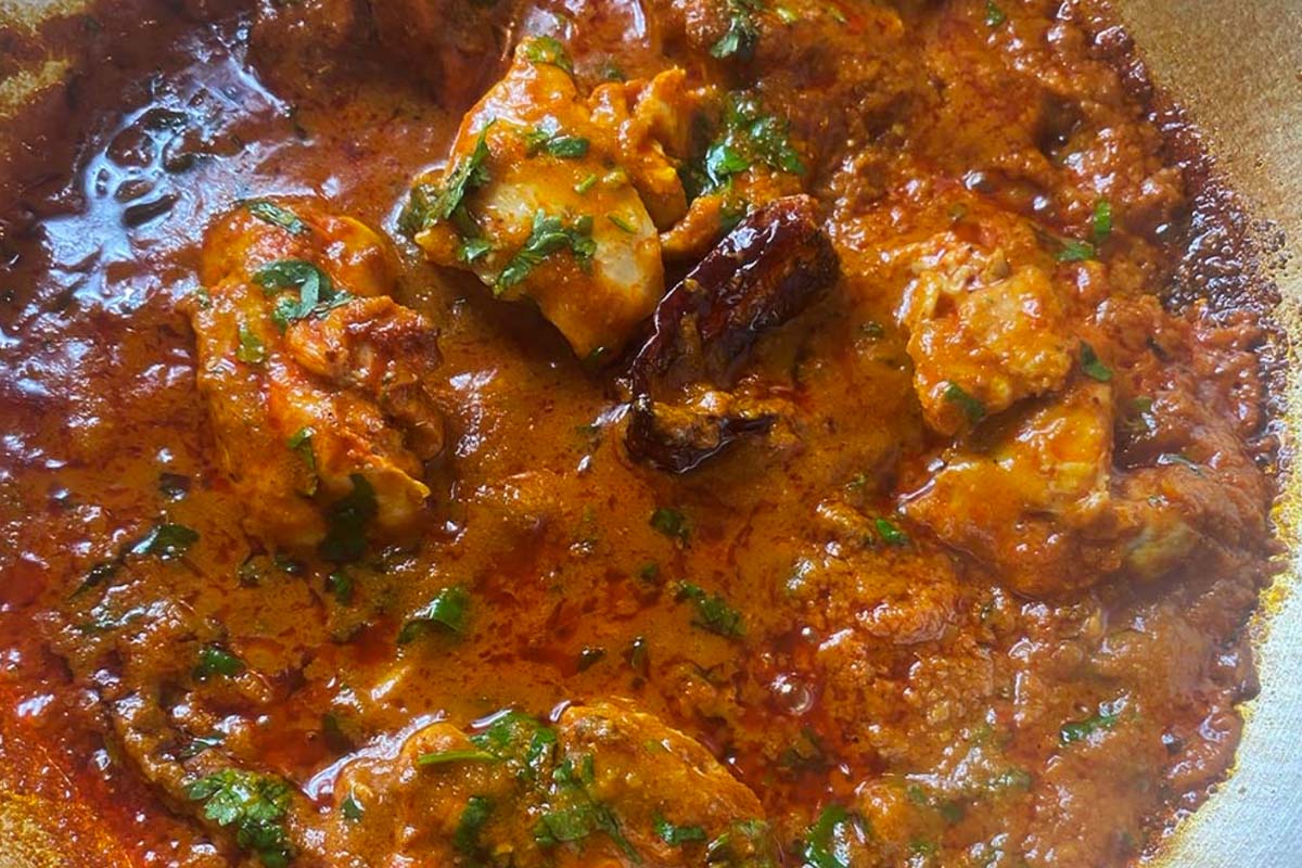 Madras was created by spicing up a basic curry dish. It is normally made with beef cooked in a fragrant but fiery sauce using ingredients such as hot chili powder, cumin, garam masala, and turmeric.