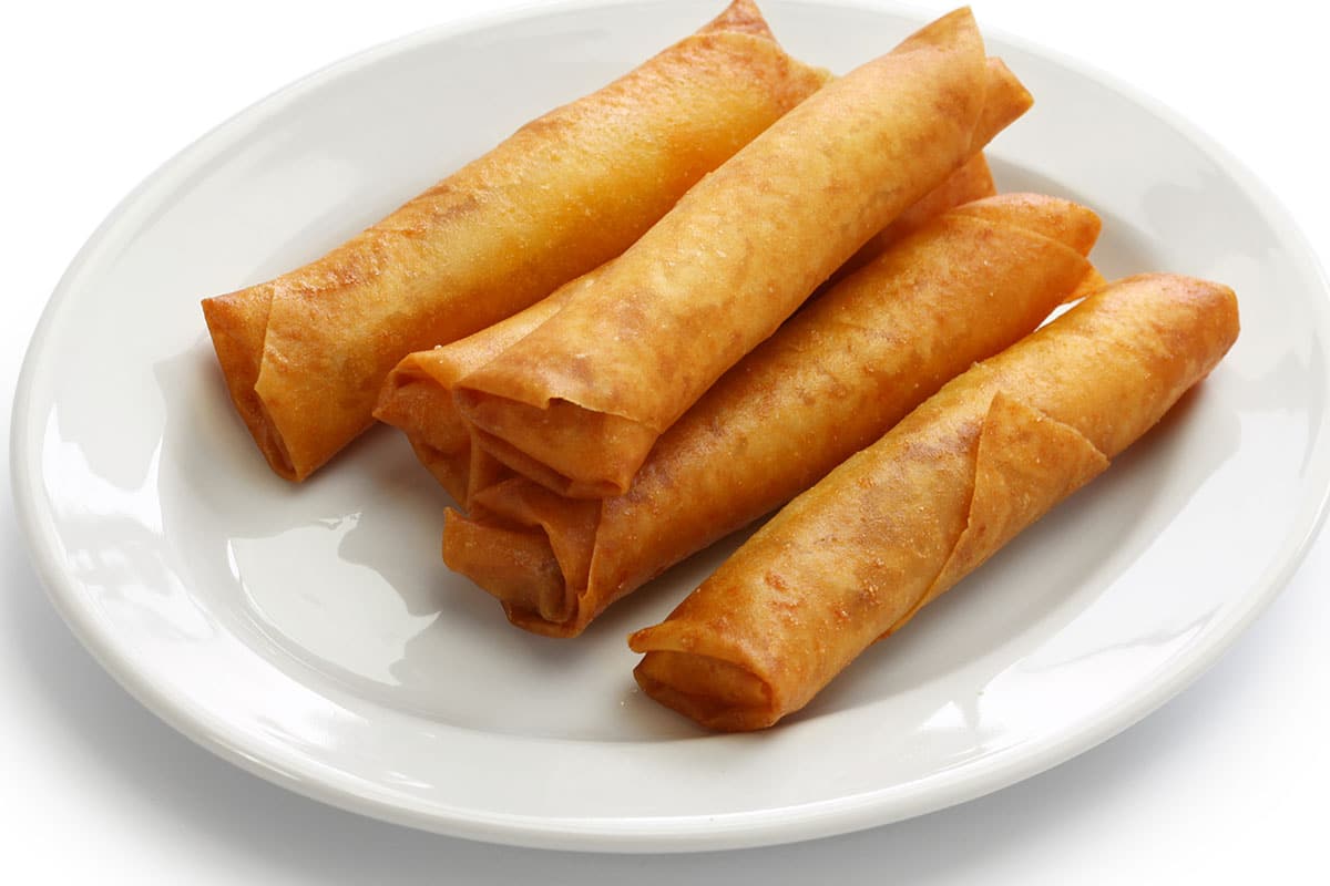 The idea is to fry them nice and slowly to allow them to brown gradually. If your egg rolls brown very quickly, the oil you're using is too hot, and the egg rolls will not turn out nice and crispy. They will burn.