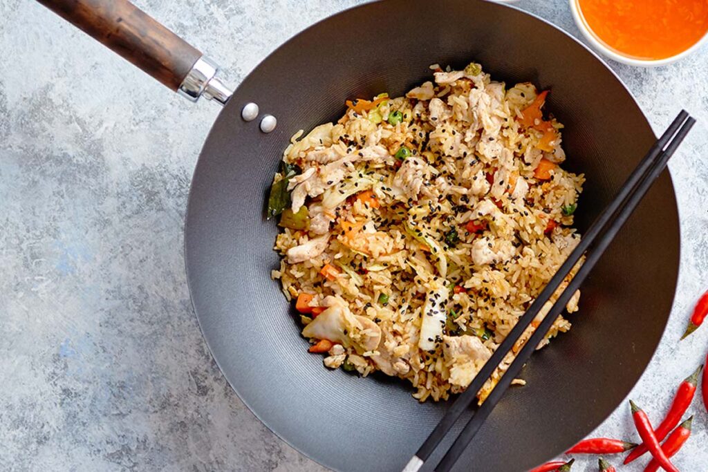 If you want your fried rice to have that lovely smoky burnt flavor that restaurants managed to produce, you need to use an extremely hot wok.