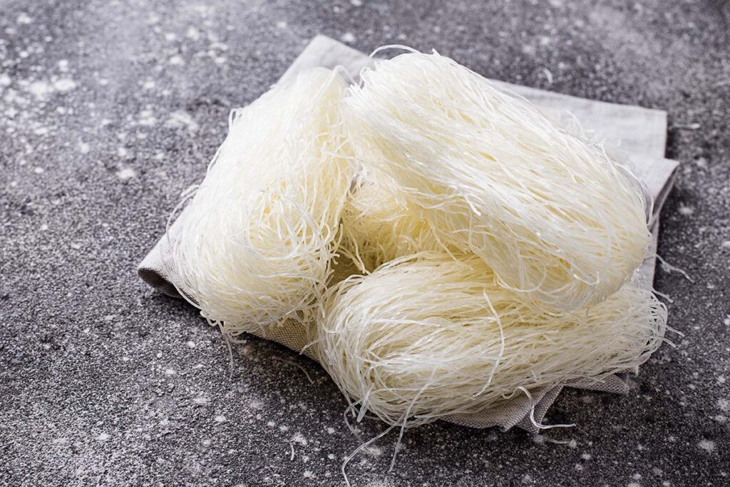 Vermicelli rice noodles are white, very thin, and delicate in texture. You can add them to a wide variety of dishes, including soups, stir-fries, and spring rolls.