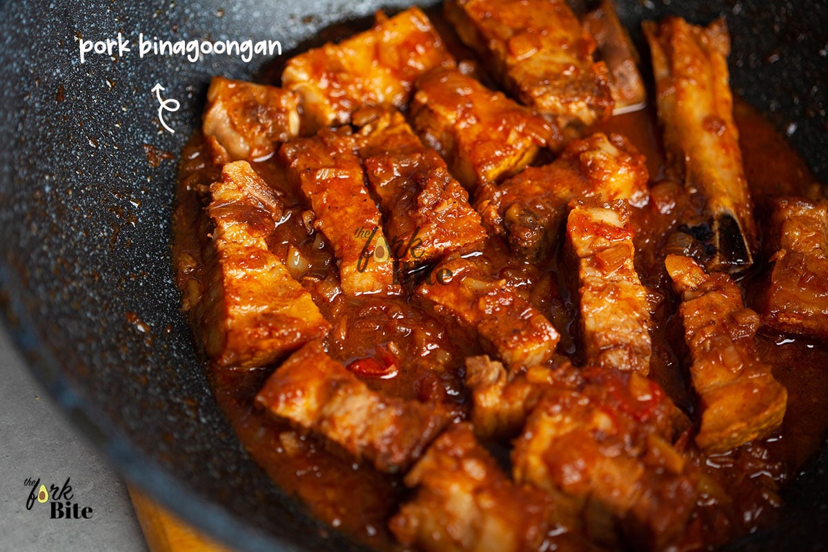 Transfer the binagoongang pork to a serving bowl, garnish with fried chili leaves, if desired, and serve with steamed rice.