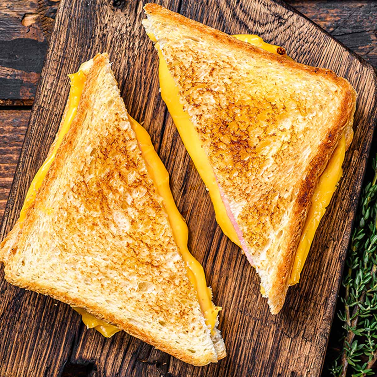 People have been eating bread and cheese for centuries, but the first grilled cheese sandwiches to appear in the States were back in the 1920s, and they were pretty basic. 