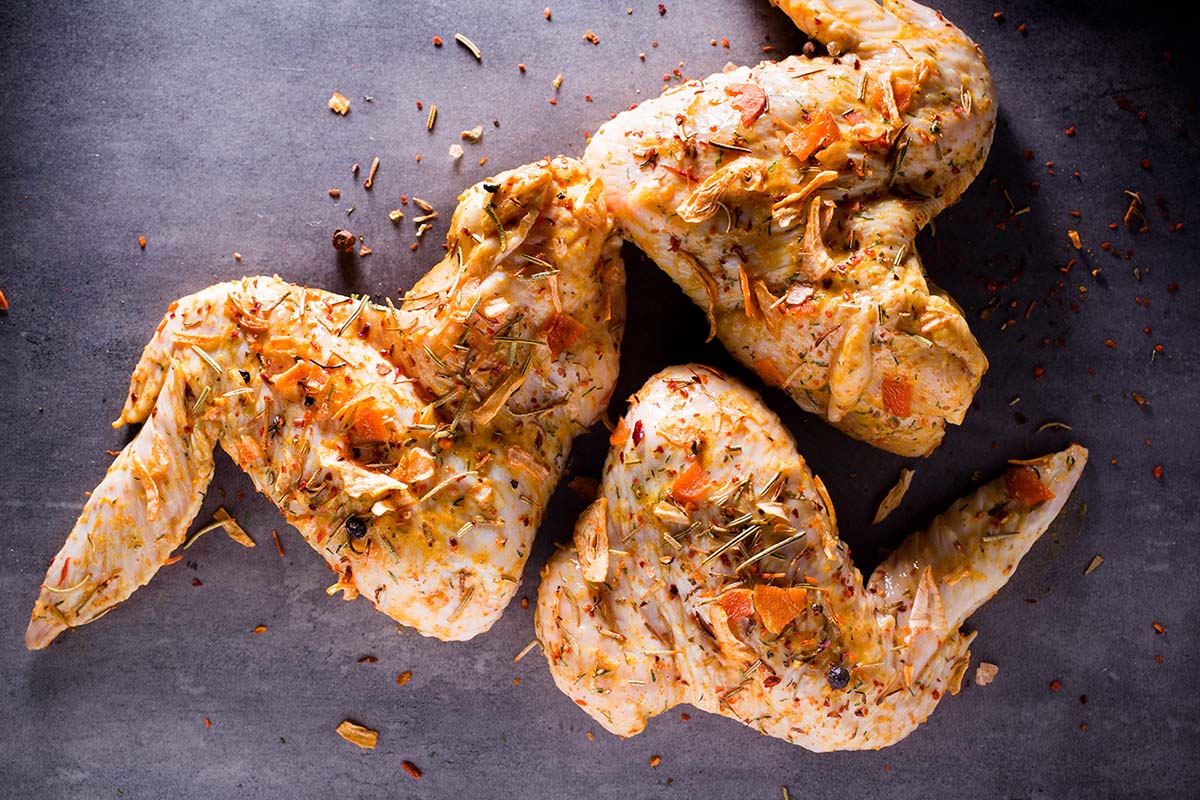 This marinade uses natural, mild, occurring acids from certain liquids that help to denature the proteins in the chicken that usually traps the moisture. Ingredients like vinegar, buttermilk, yogurt, apple juice, and wine are examples of acidic liquids for marinades.