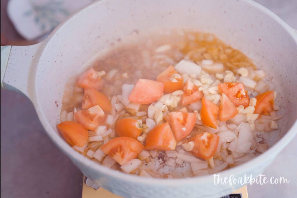 Pour some beef broth (or red wine) to add more flavor and lift off all the stuck flavors at the bottom of the pan. The wine is optional. It has all the beefy flavors you want in your stew.