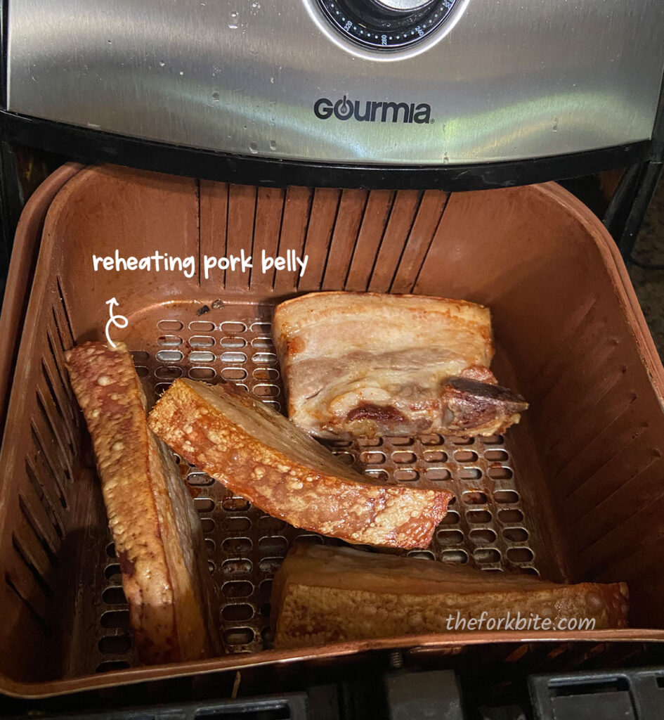 Position the pork belly skin side up. If it cannot stand straight, lean it to one side. That way, the skin will still be facing more heat. Check the pork belly after 5 to 6 minutes; this will help you see how things are progressing.