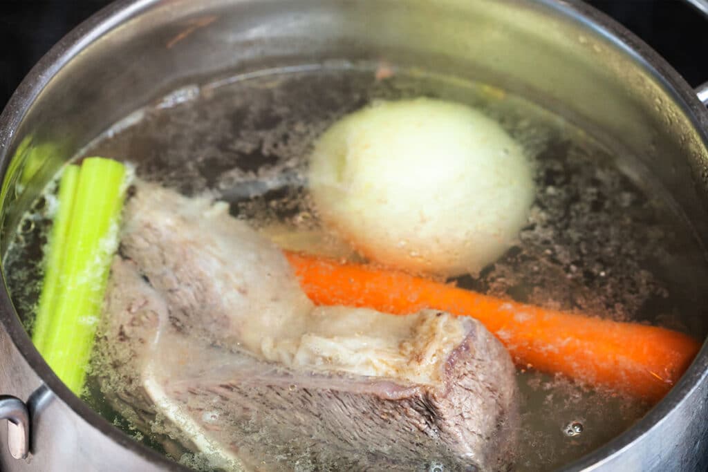 The gelatin, and collagen from the beef will render into the stock, and you slow cook the meat.  They will leave a layer of fat on the top of the stew. This is not a palatable thing to see if this layer of fat will prevent you from tasting all the flavors of the beef stew. 