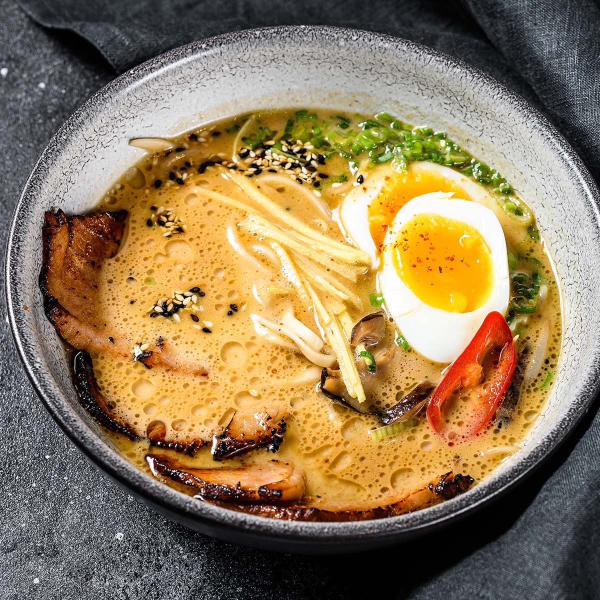 It's pretty easy to reheat ramen in one of two different ways, and you can even enhance the flavor by adding in some new goodies; why not?