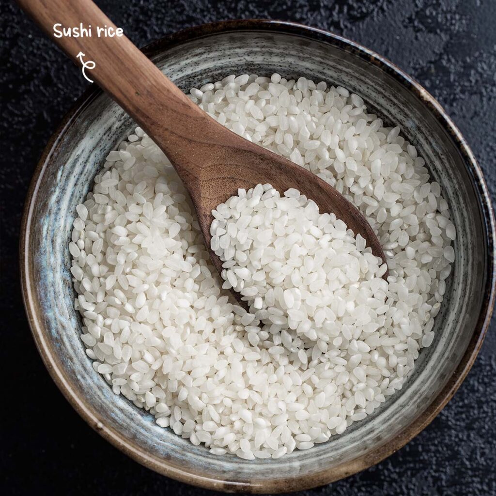 Sushi rice has a sticky or gluey consistency complemented by adding sugar, rice vinegar, and salt. It's natural stickiness is paramount in holding the sushi rice together.