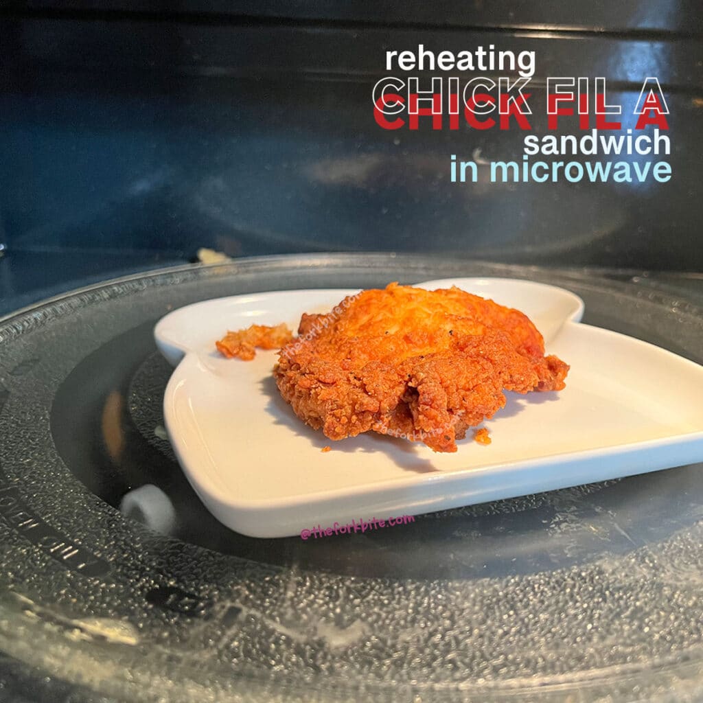 Transfer the chicken fillets onto a microwave-safe plate and give it a 30-second nuke on full power. Check to see if it's warmed through evenly. If not, continue to reheat at 5 to 10-second intervals until it warmed all the way through.