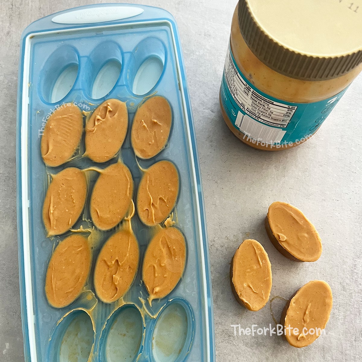 Fill ice cube trays with peanut butter and freeze them to make smaller servings. Tap the tray to release the air bubbles, wrap the tray in plastic, and flash freeze for one or two hours. After they have frozen solid, you can transfer them into a resealable plastic bag