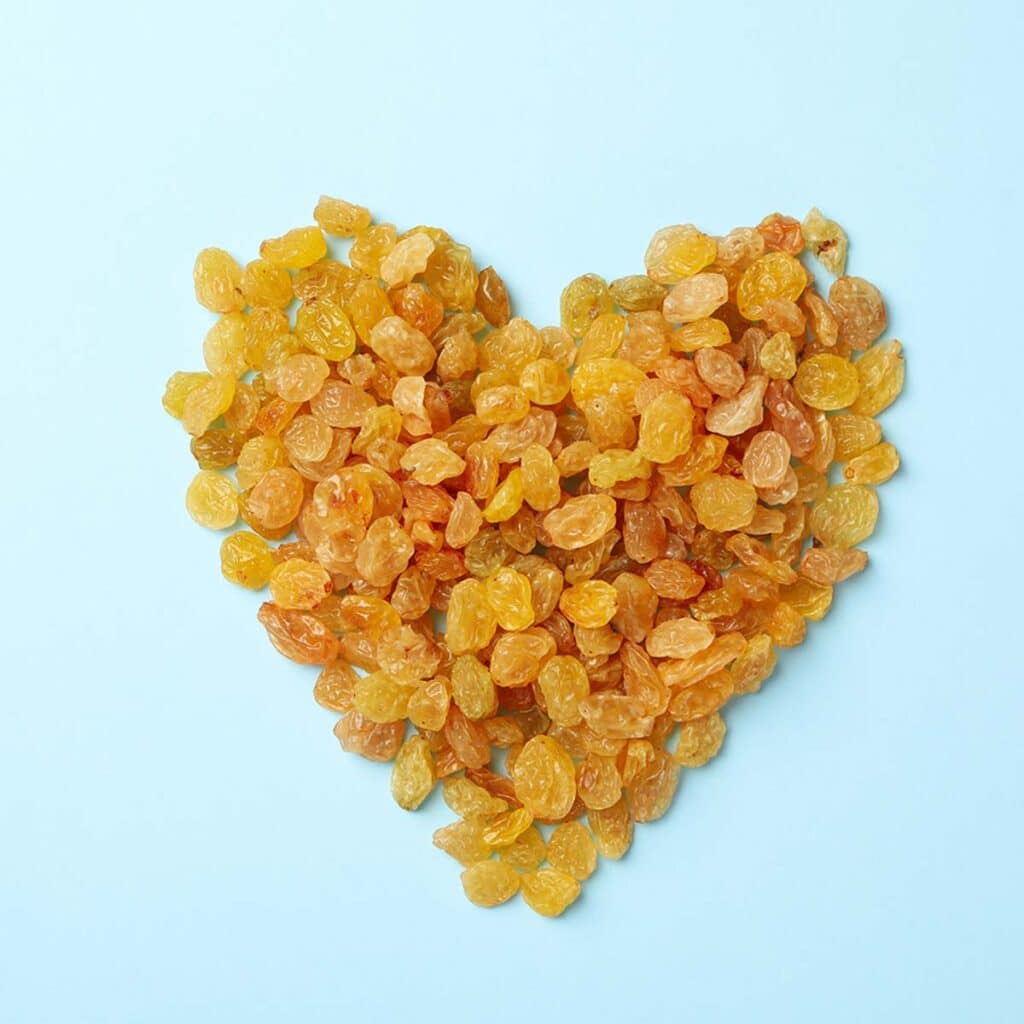 Golden raisins, also known as Sultanas, are dried grapes with a golden color from seedless white-fleshed grapes.