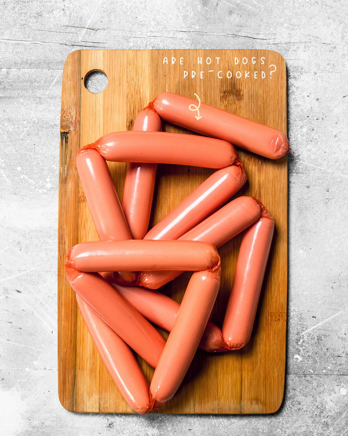 Hotdogs are already cooked before they are packaged and sold. In fact, the U.S. Department of Agriculture requires that hotdogs be cooked to an internal temperature of 155° Fahrenheit before selling them to consumers. 