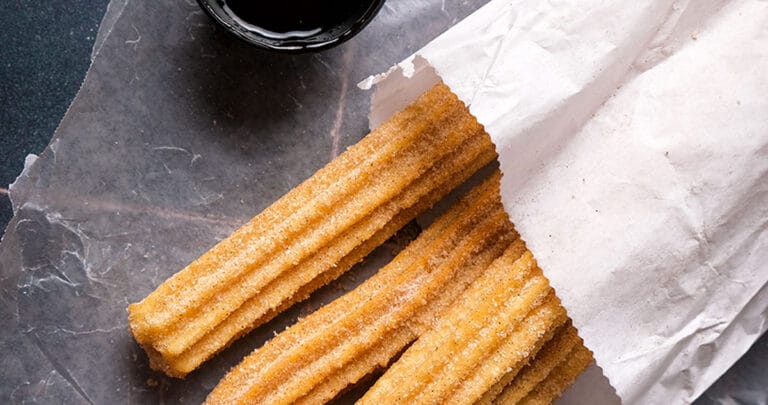 A quick and easy way to reheat churros is to heat them in an oven or air fryer. This ensures that all the sides of the churro are reheated