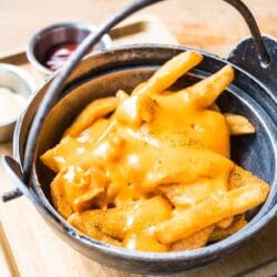 These copycat Wingstop cheese fries are just like the ones you love from Wingstop, but they're much easier (and cheaper) to make at home.