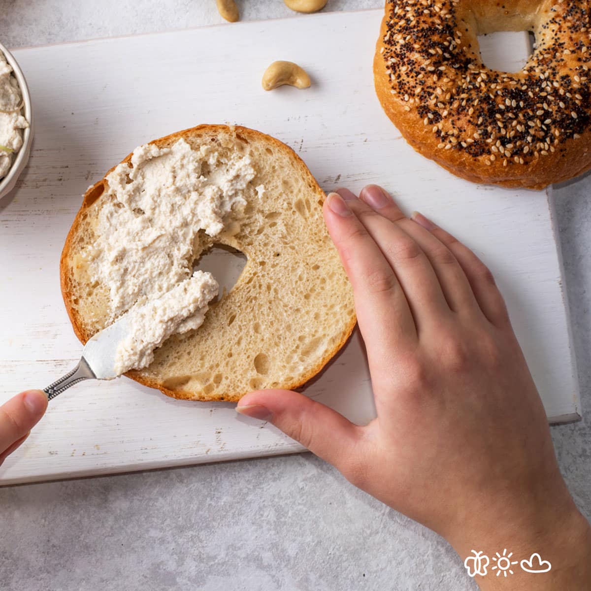 Cream cheese spread is spreadable by adding other ingredients like milk, cream, or stabilizers. Compared to cream cheese, spreads made with these ingredients are softer and easier to apply.