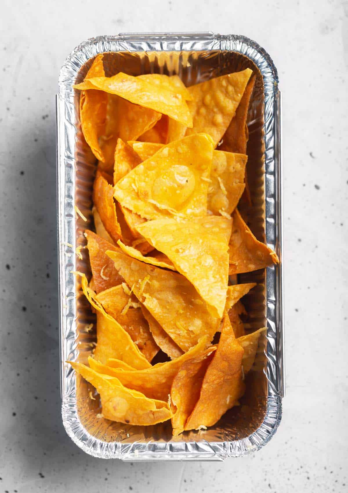 How to take your snack game to the next level? Believe it or not, heating up tortilla chips can be a game-changer. You don't have to settle for opening a new bag when your old chips are stale and soggy. The best way to heat up tortilla chips is in the oven.