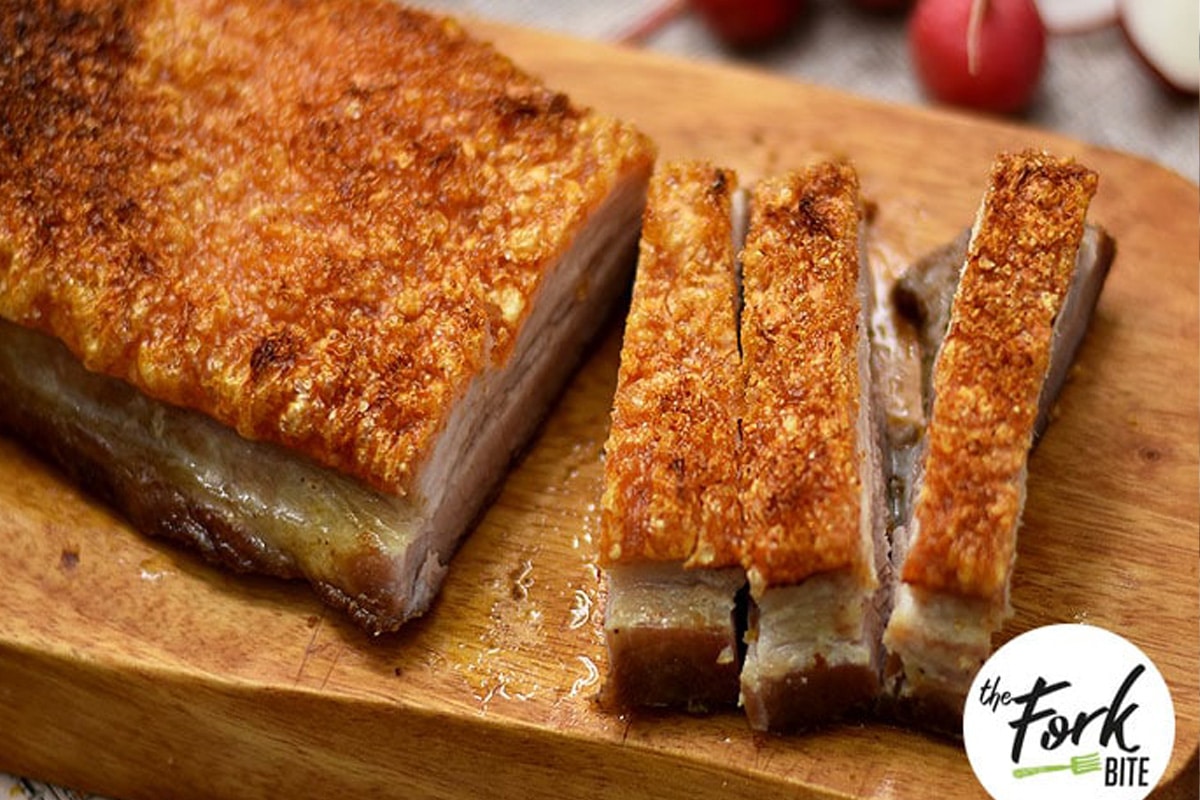 Slice the pork belly into thick, bite-sized pieces. Plate it up and serve with classic mustard or your favorite dip on the side.