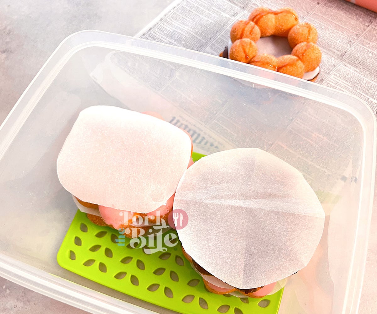 Now that the Mochi donuts are wrapped and ready to go, you can store them in food-grade, airtight containers like Tupperware or zip-lock bags.