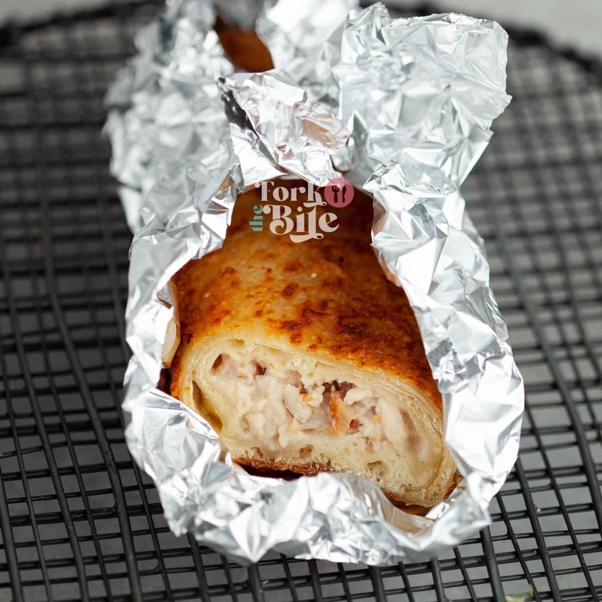 Loosely cover the chicken bakes with a piece of aluminum foil to protect the top layer from burning.
