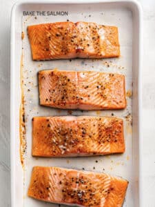 A salmon fillet placed on a baking sheet ready for the oven. Remember, bake approximately 10 minutes per inch of thickness.
