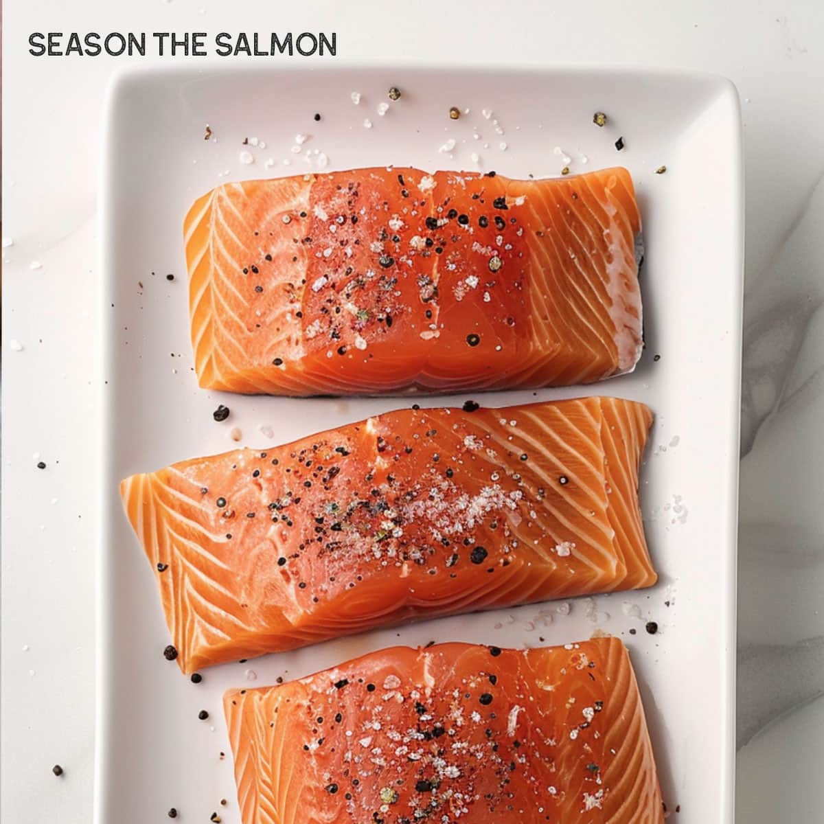 Get that perfect sear! Season your salmon generously with salt and pepper.