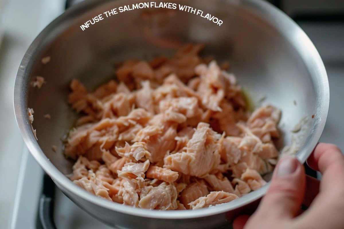Salmon flakes, sake, mirin, and soy sauce sizzling in a pan for a flavor-infused recipe.