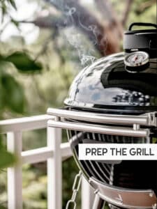 Preparing a charcoal grill for cooking salmon – hot coals arranged, grill closed for preheating.