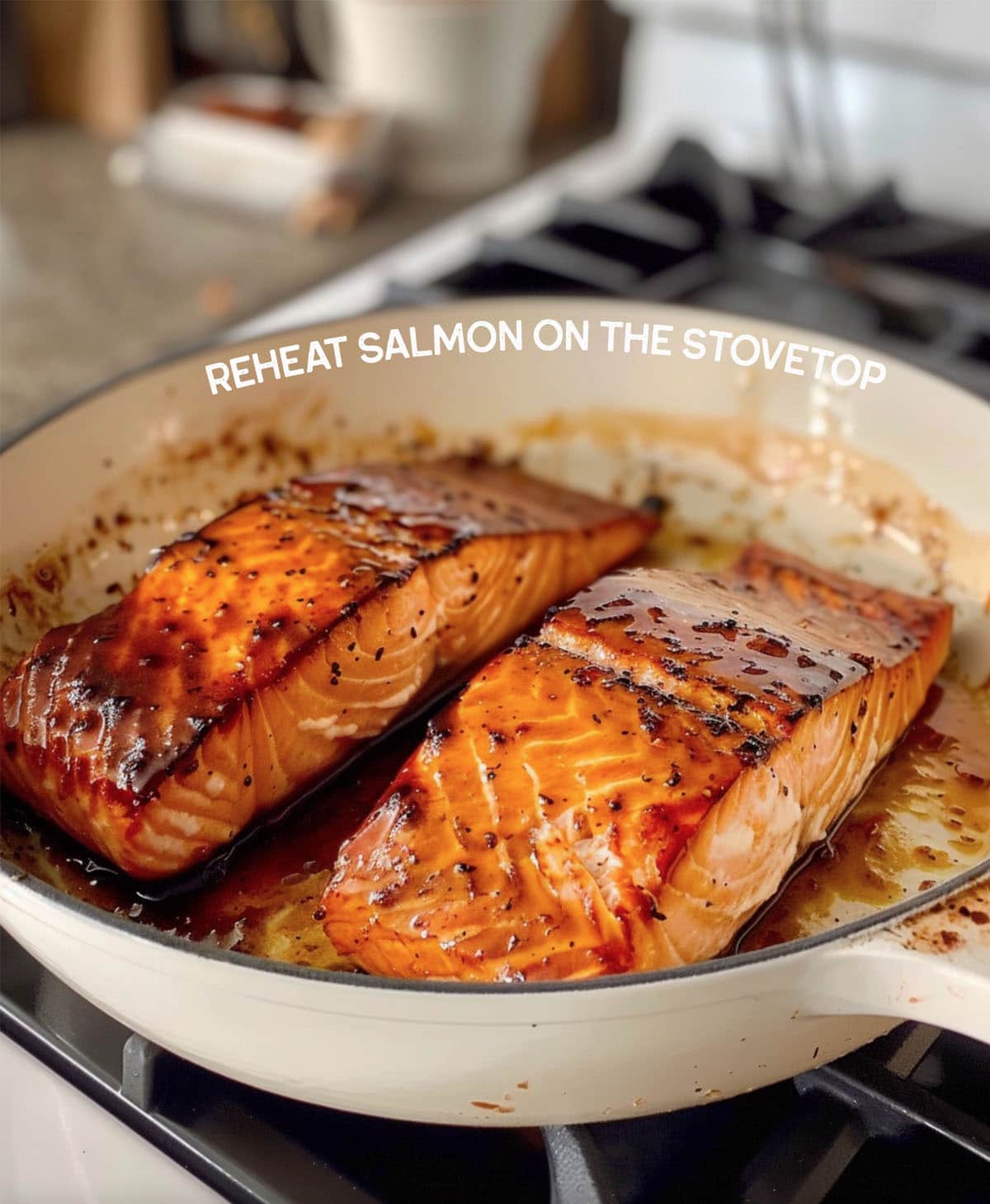 Salmon reheating in a skillet on a stovetop.