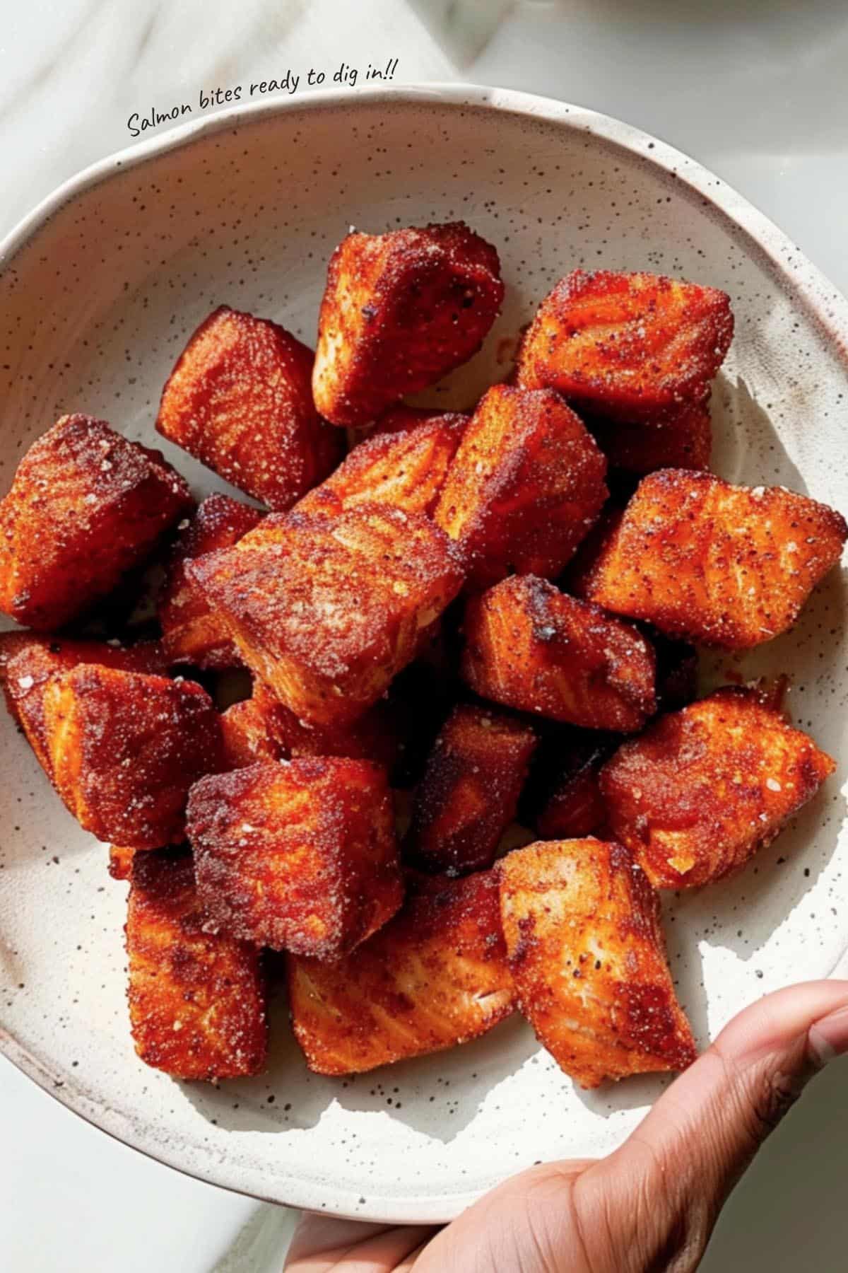 Air fryer salmon bites with dipping sauce, perfect for converting non-salmon lovers.